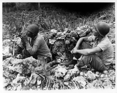 Two Indian Marine Observers on Hill Overlooking Garapan Emulate the Silent Watchfulness of their Forefathers while Manning their Observation Post