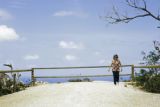 Guam, woman walking on beach