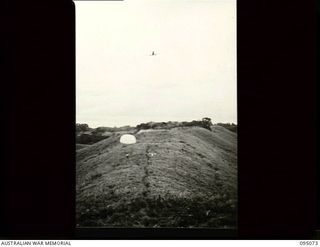 Kiarivu, New Guinea. 1945-08-06. After a patrol from the 2/7th Australian Infantry Battalion, AIF, occupied a feature around the Kiarivu emergency landing ground a C47 Douglas aircraft dropped ..