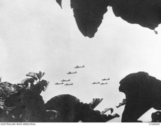 New Guinea. C. 1943. Formation of Japanese Betty bomber aircraft in flight in the New Guinea area. Photograph possibly taken by a Coast Watcher