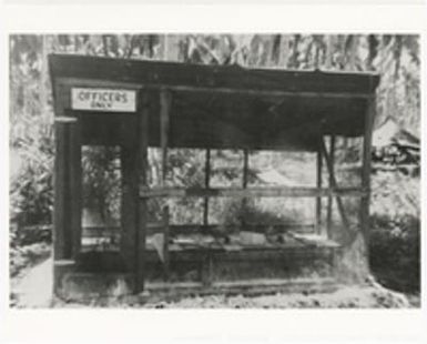 ["Officers Only" pit toilet at Marine air base in Guadalcanal]