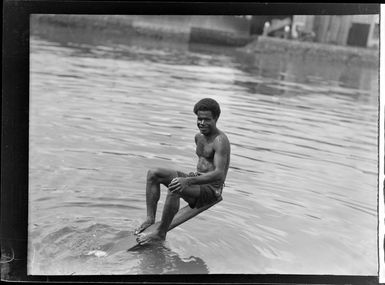 An unidentified man swimming, Suva, Fiji
