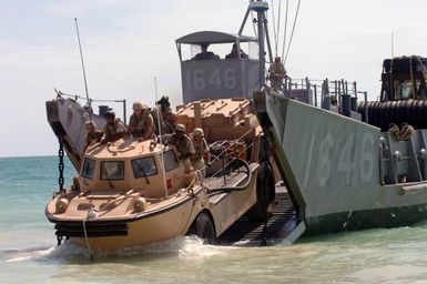 A US Navy (USN) Logistical Amphibious Recovery Craft (LARC) disembarks from USN Landing Craft Utility 1646 (LCU 1646) assigned to Beachmaster Unit 1(BMU-1) at a beach at Bellows Air Force Station (AFS), Hawaii (HI), during an amphibious assault training during Exercise Rim of the Pacific (RIMPAC) 2006. The exercise designed to increase the tactical proficiency of participating units in a wide array of combined sea operations. RIMPAC 2006 brings together military forces from Australia (AUS), Canada (CAN), Chile (CHL), Peru (PER), Japan (JPN), the Republic of Korea (KOR), United Kingdom (UK) and the United States (US)