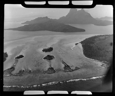 Bora Bora, Society Islands, French Polynesia, showing lagoon and barrier reef