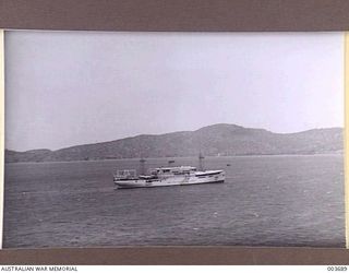 PORT MORESBY - KPM LINER, MATSUECKER, IN THE HARBOUR. RAAF SURVEY FLIGHT. (NEGATIVE BY N. TRACY)