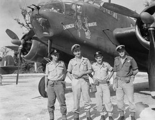 MADANG, NEW GUINEA. C. 1945-05. CREW OF BEAUFORT BOMBER AIRCRAFT A9-500 OF NO. 15 SQUADRON RAAF. LEFT TO RIGHT: 403843 FLIGHT LIEUTENANT HARRY REGINALD SILCOCK, NEWCASTLE, NSW, PILOT; 437010 FLYING ..