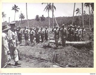 MUSCHU ISLAND, NEW GUINEA. 1945-09-24. MAJOR GENERAL H.C.H. ROBERTSON, GENERAL OFFICER COMMANDING 6 DIVISION, INSPECTING JAPANESE PERSONNEL. THE JAPANESE PERSONNEL ON MUSCHU ISLAND WERE ASSEMBLED ..