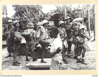 TOROKINA, BOUGAINVILLE. 1945-09-14. SOME OF THE MEMBERS OF THE PARTY OF 79 CHINESE WHO ARRIVED BY TRUCK AT TOROKINA COMPOUND. FORMER PRISONERS OF THE JAPANESE THEY WERE RELEASED WHEN AUSTRALIAN ..