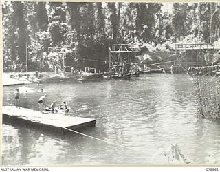 TOROKINA, BOUGAINVILLE ISLAND. 1945-02-04. THE LARGE SWIMMING POOL OF THE 15TH INFANTRY BRIGADE NEAR THE LINES OF THE 58/59TH INFANTRY BATTALION