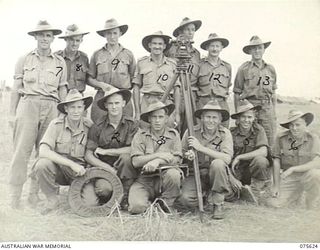 MARKHAM VALLEY, NEW GUINEA. 1944-08-28. PERSONNEL OF THE SURVEY SECTION, 4TH FIELD REGIMENT. IDENTIFIED PERSONNEL ARE: VX83190 GUNNER G. HARMAN (1); VX68608 LANCE-BOMBARDIER K.W. MOULDAY (2); ..