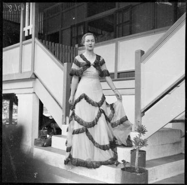 Portrait of Ruth McNicholl standing on the steps outside the Chinnery's house, Malaguna Road, Rabaul, New Guinea, ca. 1936 / Sarah Chinnery