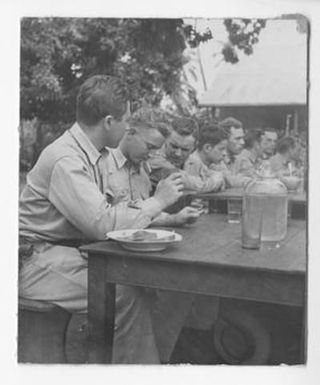 [Men Eating A Meal]