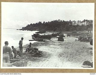 WANDOKAI BEACH, NEW GUINEA. 1943-12-31. A GENERAL VIEW OF THE BEACH, WHICH LIES BETWEEN HUBIKA AND AGO