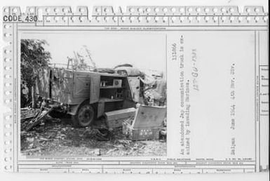 An Abandoned Japanese Communication Truck is Examined By Invading Marines