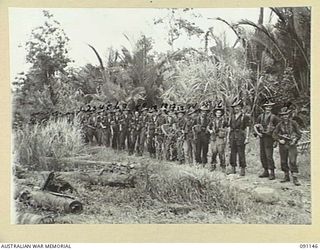 Personnel of the Fighting Patrol from C Company, 2/1 Infantry Battalion. Identified: unidentified Artillery Signaller, 2/2 Field Regiment (1); unidentified Artillery Signaller, 2/2 Field Regiment ..