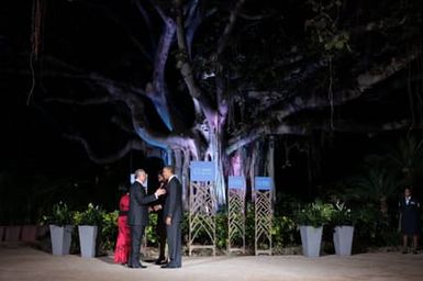 Barack Obama and Michelle Obama welcome Asia-Pacific Economic Cooperation leaders and spouses in Honolulu, Hawaii, November 12, 2011