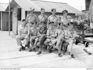 Probably Cairns, Qld. 1944-01-12. Group portrait of the crew of the Catalina flying boat aircraft of No. 43 Squadron RAAF, which survived a hit by anti-aircraft fire during a night bombing raid on ..