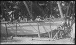 One end of a large sailing canoe on Tabiteuea, ready to be launched