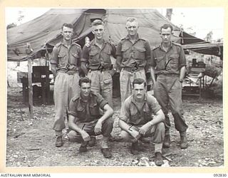 WEWAK AREA, NEW GUINEA. 1945-06-05. THE STAFF OF 3 MOBILE METEOROLOGICAL FLIGHT, RAAF, ATTACHED HEADQUARTERS ROYAL AUSTRALIAN ARTILLERY 6 DIVISION. IDENTIFIED PERSONNEL ARE:- SIGNALMAN E.A. WOOD ..