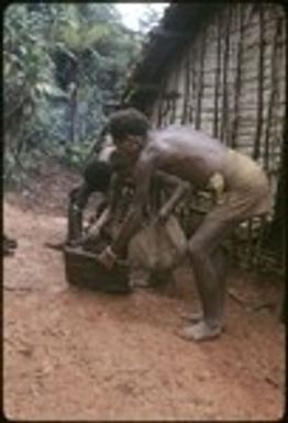 Men laying out a mat