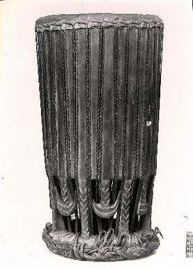 Photo of Wooden object with sinnet woven through. British Musem