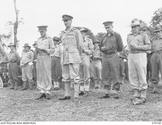 DUMPU, NEW GUINEA. 1944-02-06. NX231 BRIGADIER FRED O. CHILTON DSO (1), 18TH INFANTRY BRIGADE, AT THE DEDICATION SERVICE OF THE DUMPU WAR CEMETERY WITH VX9 MAJOR-GENERAL G.A. VASEY CB CBE DSO (2), ..