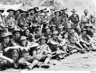 FARIA VALLEY, NEW GUINEA, 1944-02-09. MEMBERS OF "B" COMPANY, 2/10TH INFANTRY BATTALION AT BEVERIDGE'S POST. THEY ARE ON THEIR WAY TO POSITIONS AT RAMU VALLEY AFTER BEING RELIEVED BY THE 58/59TH ..