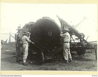 HANSA BAY-SEPIK RIVER AREA, NEW GUINEA. 1944-08-03. NX115529 LIEUTENANT R.A. DICKSON OFFICER COMMANDING, 5TH DIVISION SALVAGE UNIT (1), VX133200 LIEUTENANT C. HARDEE (2) AND SX20846 CAPTAIN B.R. ..