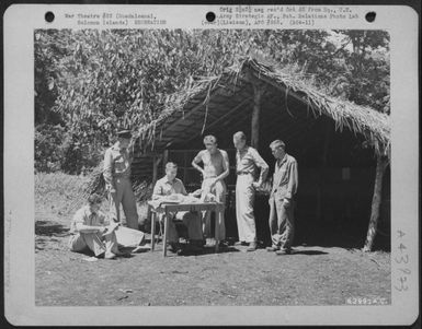 Air Force Personnel Eagerly Await Mail Distribution On Guadalcanal, Solomom Islands, October 1942. (U.S. Air Force Number 62991AC)