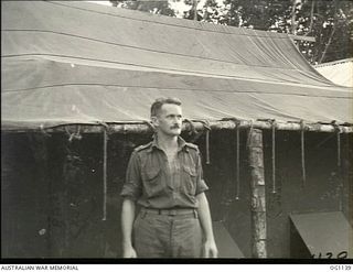 NADZAB, NEW GUINEA. 1944-05-09. INFORMAL PORTRAIT OF SQUADRON LEADER ADRIAN MCGLYNN, SYDNEY, NSW, COMMANDING OFFICER, NO. 23 MEDICAL CLEARING STATION RAAF