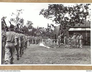 17 MILE, PORT MORESBY AREA, NEW GUINEA. 1943-12-24. VX247 BRIGADIER C.A. STINSON, DEPUTY DIRECTOR OF ORDNANCE SERVICES HEADQUARTERS, NEW GUINEA FORCE (2) TAKING THE SALUTE FROM TROOPS OF THE 10TH ..