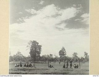 LAE, NEW GUINEA. 1944-09-02. THE UNIT FOOTBALL FIELD OF THE 22ND WORKS COMPANY, ROYAL AUSTRALIAN ENGINEERS. THE AREA, CLEARED OF HEAVY JUNGLE GROWTH BY OFFICERS OF THE UNIT, CONTAINS A CONCRETE ..