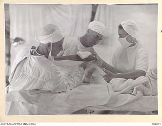 TOROKINA, BOUGAINVILLE, 1945-07-16. AN OPERATION IN PROGRESS IN THE OPERATING THEATRE, 106 CASUALTY CLEARING STATION