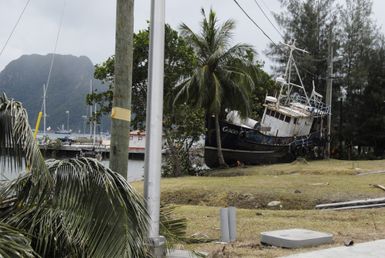 Earthquake ^ Tsunami - Pago Pago, American Samoa, October 1, 2009 -- Pago Pago, American Samoa, October 1, 2009 - A boat sits on its side as it was moved during the tsunami that hit American Samoa.