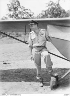 NEAR MAWARAKA, BOUGAINVILLE ISLAND, SOLOMON ISLANDS. C. 1945-02-07. 407321 FLIGHT LIEUTENANT W. R. GOLDSWORTHY, ADELAIDE, SA, WHO PILOTED THE FIRST AIRCRAFT TO LAND ON THE NEW VERNON AIRSTRIP. THE ..