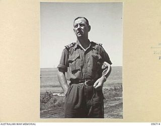 WEWAK POINT, NEW GUINEA, 1945-09-19. LIEUTENANT W.E. HOWARD, ROYAL AUSTRALIAN NAVAL VOLUNTEER RESERVE (RANVR), PORT DIRECTOR OF WEWAK, WHO REPRESENTED THE RAN AT THE SURRENDER OF JAPANESE FORCES ON ..