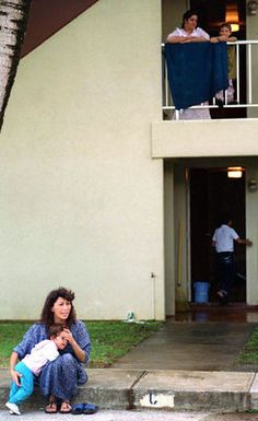 Kurdish evacuees relax outside a family housing complex used as their temporary lodging at Andersen Air Force Base, Guam, during Operation PACIFIC HAVEN. The operation, a joint humanitarian effort conducted by the US military, entails the evacuation of approximately 2,400 Kurds from northern Iraq to avoid retaliation from Iraq for working with the US government and international humanitarian agencies. The Kurds will be housed at Andersen AFB, while they go through the immigration process for residence in the United States