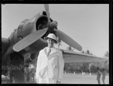 Mr W Tailby, in front of an aircraft, Rarotonga, Cook Islands