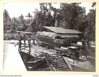 KALUMALAGI RIVER, JACQUINOT BAY, NEW BRITAIN, 1945-08-12. A BARGE ON THE SLIPWAY AT 1 INFANTRY TROOPS WORKSHOP