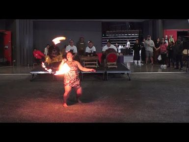 Wāhine Toa making a stamp in Siva Afi - Samoan fire knife dancing