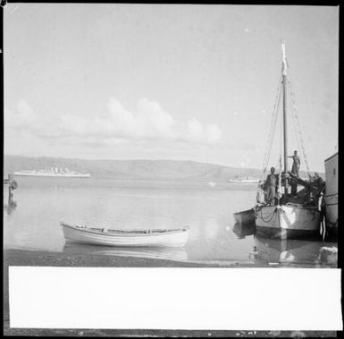 Ship moored to a jetty with a rowboat across the foreground and HMAS Australia [?] in the background, Rabaul Harbour, New Guinea, 1937 / Sarah Chinnery