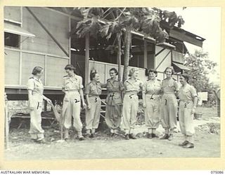SOUTH ALEXISHAFEN, NEW GUINEA. 1944-08-08. SISTERS OF THE 111TH CASUALTY CLEARING STATION OUTSIDE THEIR QUARTERS. IDENTIFIED PERSONNEL ARE:- WFX33605 SISTER A. PAYNTER (1); NFX76286 SISTER I.A. ..