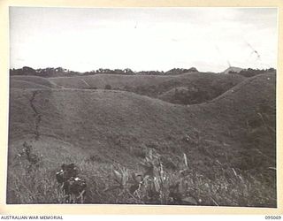 KIARIVU, NEW GUINEA, 1945-08-06. A COLUMN OF 2/7 INFANTRY BATTALION ON A TREK FROM BERIMU TO THE KIARIVU AREA DURING THEIR SIX DAY PATROL INTO ENEMY TERRITORY