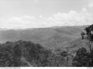 PAPUA, NEW GUINEA. 1942-10. A COMPREHENSIVE VIEW FROM A HIGH POINT ON THE TRACK OVER THE OWEN STANLEY RANGES NEAR NAURO LOOKING DIRECTLY IN THE DIRECTION OF KOKODA. THE VALLEY IS THE NAURO VALLEY, ..