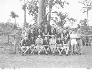 LAE, NEW GUINEA. 1944-10-01. MEMBERS OF THE AUSTRALIAN RULES FOOTBALL TEAM OF THE 22ND WORKS COMPANY. IDENTIFIED PERSONNEL ARE:- V143061 PRIVATE W.M. MANCHESTER (1); T102483 PRIVATE V.P. MAYNARD ..