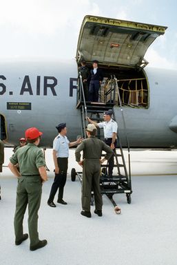 Ground crew members prepare to unload cargo, from a KC-135 Stratotanker aircraft. The aircraft, assigned to the 28th Bomb Wing is participating in Exercise Glad Customer '82