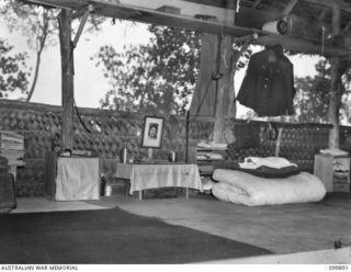 RABAUL, NEW BRITAIN, 1946-03-15. ONE OF THE SLEEPING CUBICLES IN LIVING QUARTERS AT 5 GROUP CAMP. THE CAMP IS ONE OF THIRTEEN GROUP CAMPS ESTABLISHED AROUND RABAUL FOR THE CONCENTRATION OF JAPANESE ..