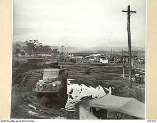 LAE, NEW GUINEA. 1944-09-27. VEHICLES WITHIN THE CAMP AREA OF THE 43RD FIELD ORDNANCE DEPOT