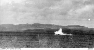 GUADALCANAL AREA, 1942. UNITED STATES DIVE BOMBER HITTING THE WATER. IT WAS SHOT DOWN BY THE UNITED STATES DESTROYER, USS SELFRIDGE