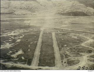 NADZAB, NEW GUINEA. 1944-02-15. AERIAL PHOTOGRAPH OF PARALLEL RUNWAYS AT ONE OF THE AIRSTRIPS AT THE ALLIED BASE